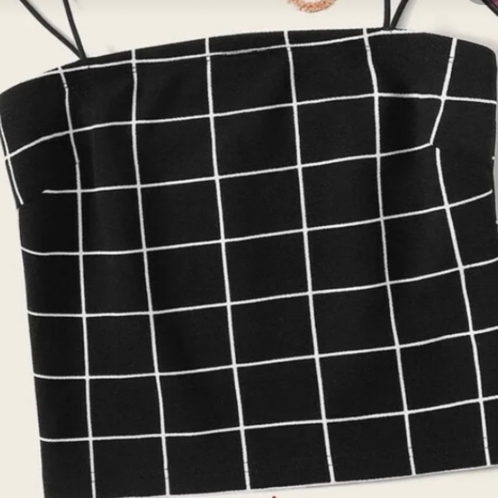 Grid tank top. Has adjustable straps.